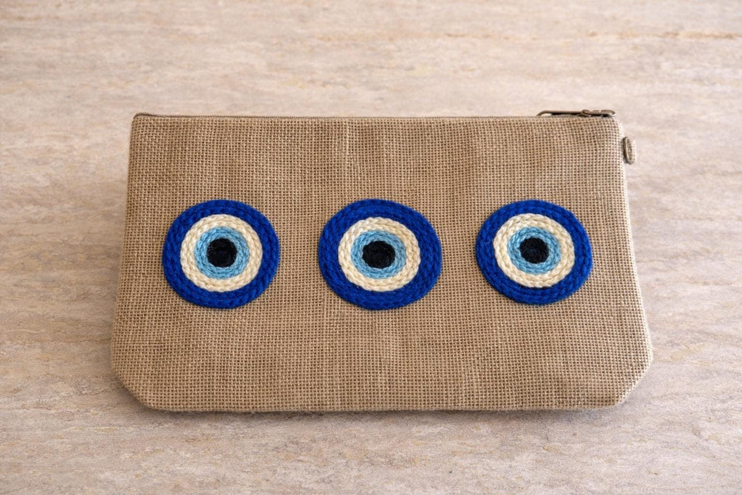 MYKONOS- Pochette jute Broderie Oeil